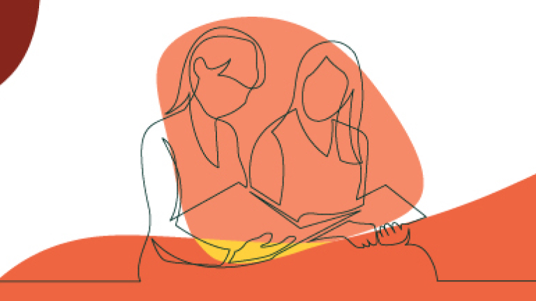 Two people reading a book